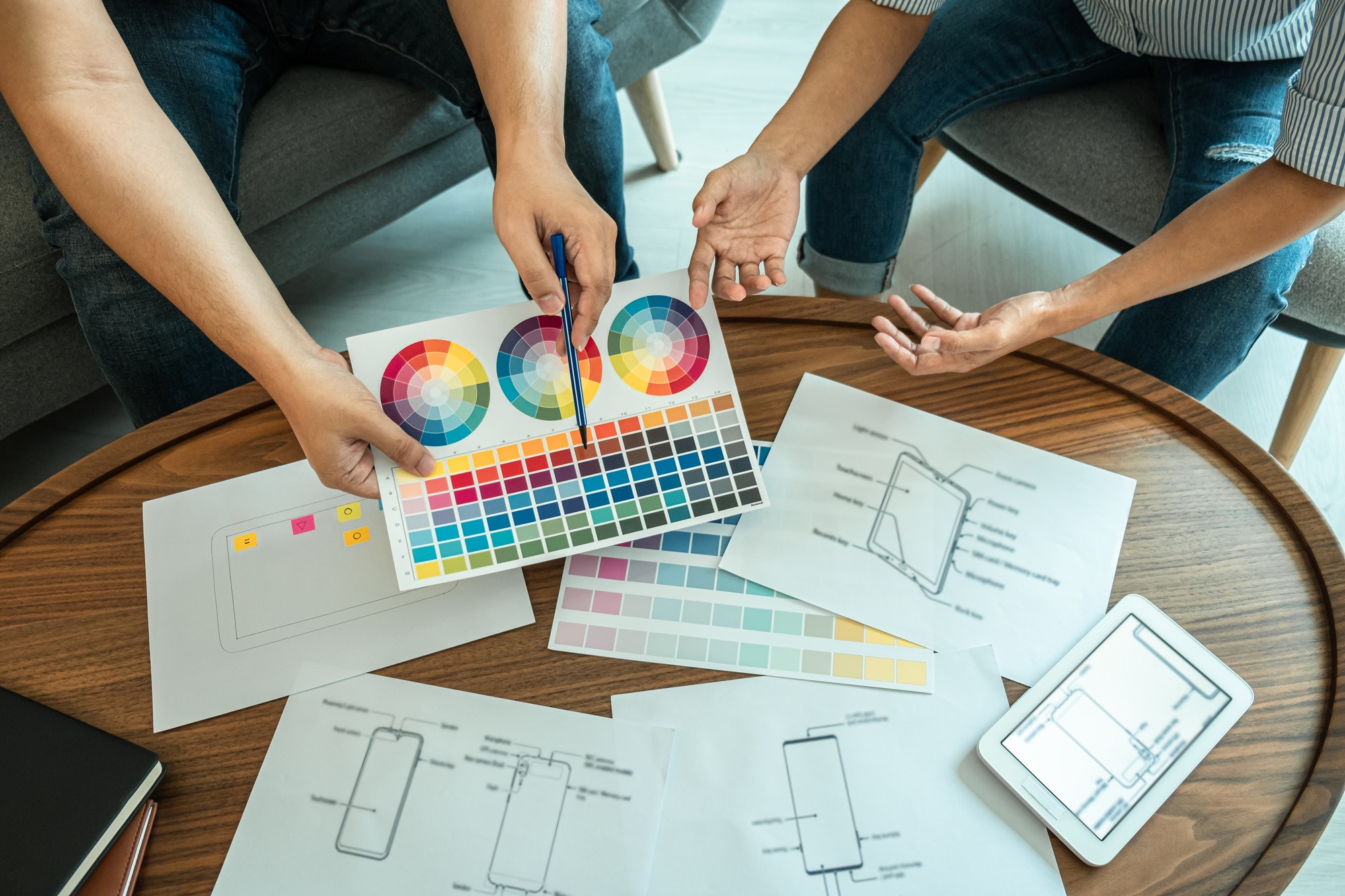 Designer drawing website ux app for mobile phone application and development template layout
